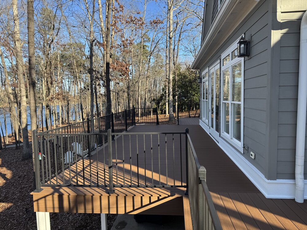 newly built stairway with 12 stairs now has sleek black metal railing