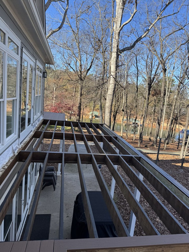 demo of large section of deck revealing deck studs