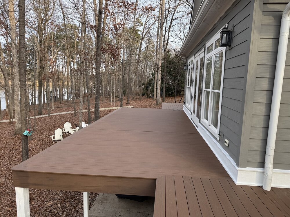 close up of precision-mitered wood corners in L-shaped corner of deck