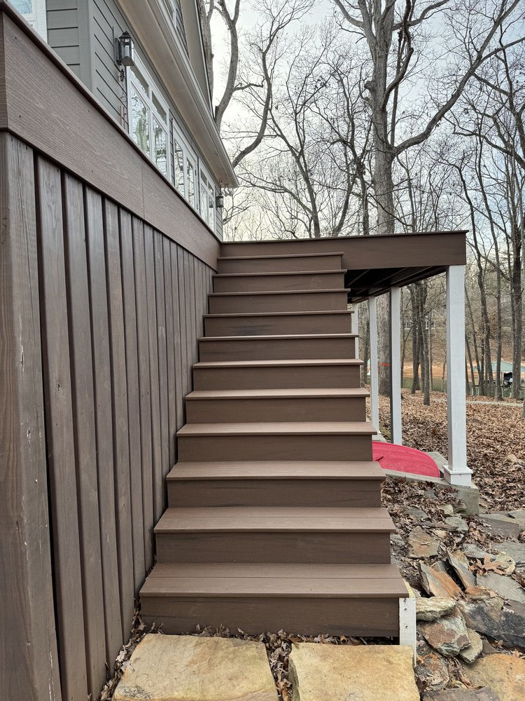 newly laid wood deck on 12 stairs leading to top deck