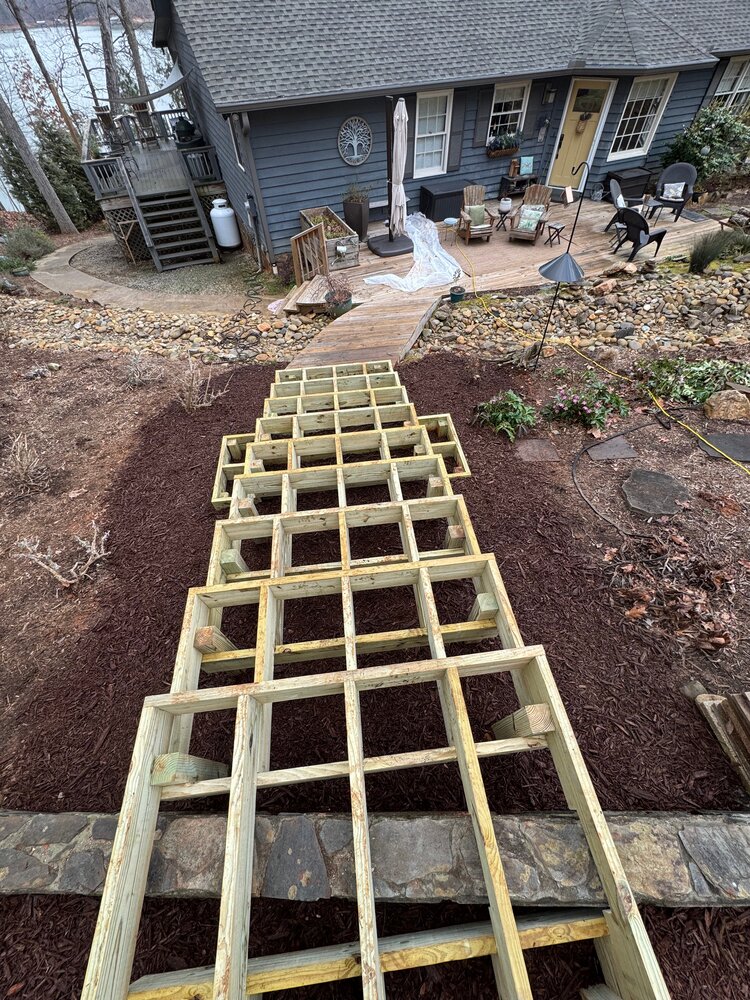 top-down view of the sturdy new staircase framed out