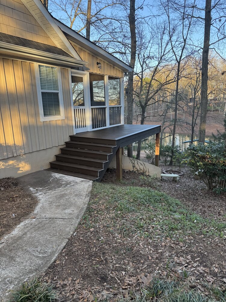 newly laid wood deck on 12 stairs leading to top deck